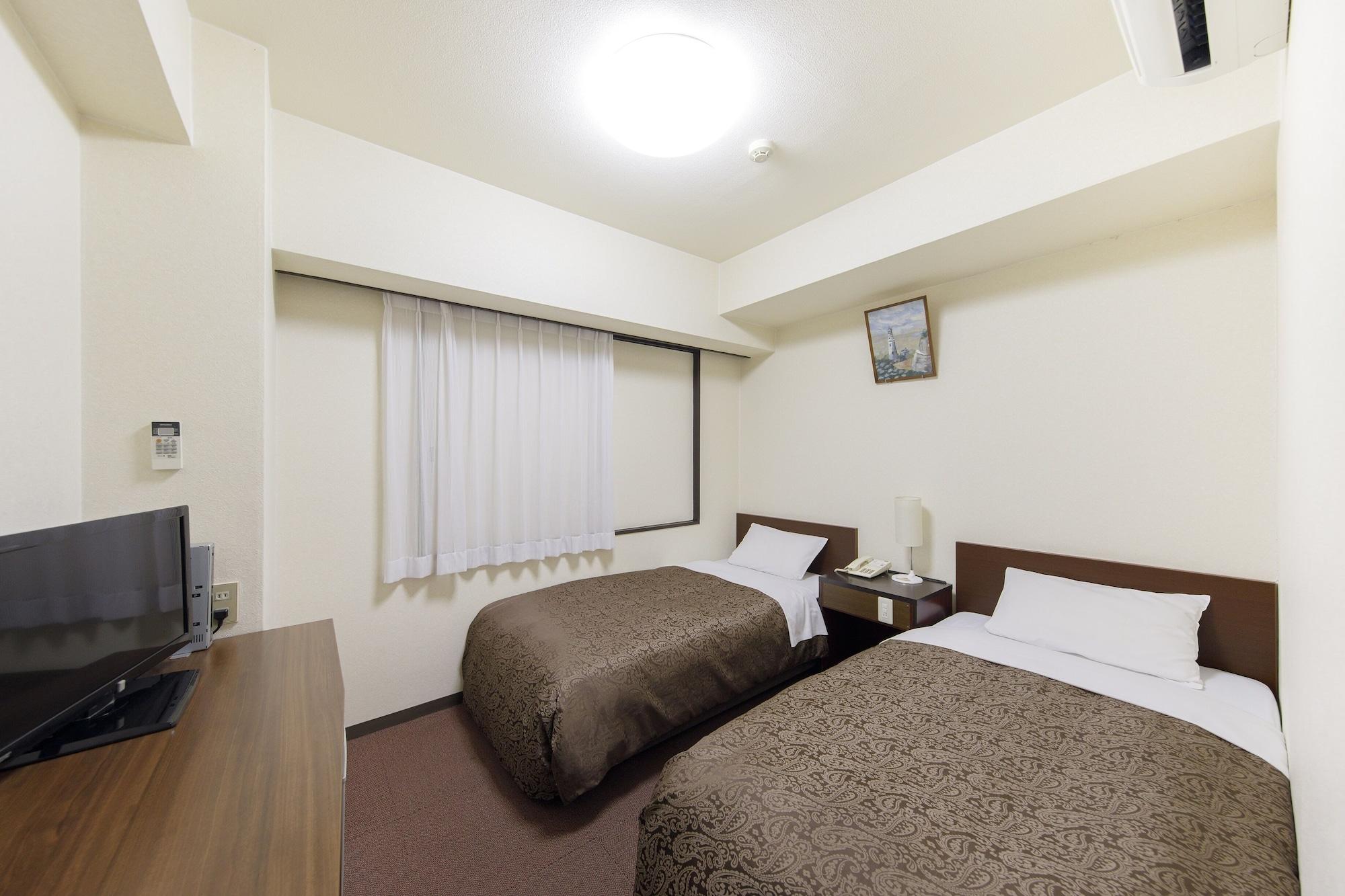 Dai-Ni Sunny Stone Hotel Suita Exteriör bild